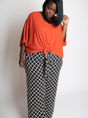 Black and white palazzo pants w/belt in Bottoms