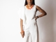 IVORY JUMPSUIT W/ DOUBLE RUFFLE SLEEVE - $35.00