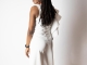 IVORY JUMPSUIT W/ DOUBLE RUFFLE SLEEVE - $35.00