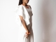 IVORY JUMPSUIT W/ DOUBLE RUFFLE SLEEVE - $35.00